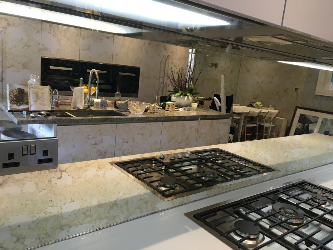 Mirror glass splashback in Iver luxury kitchen